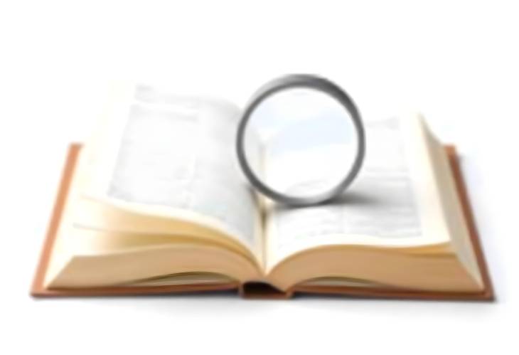 Zooming in on Knowledge Magnifying Glass Over Book